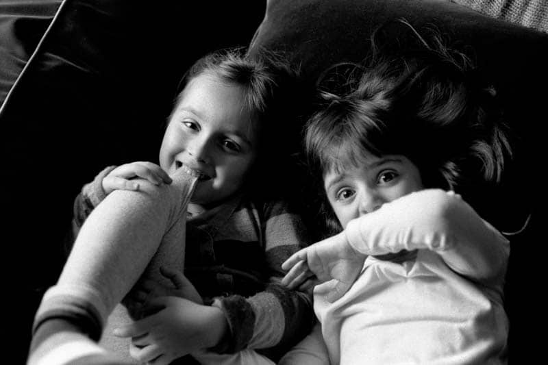 Black and white photo of two children at play